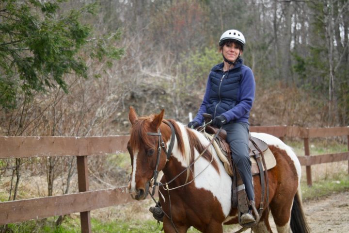 a man riding a horse
