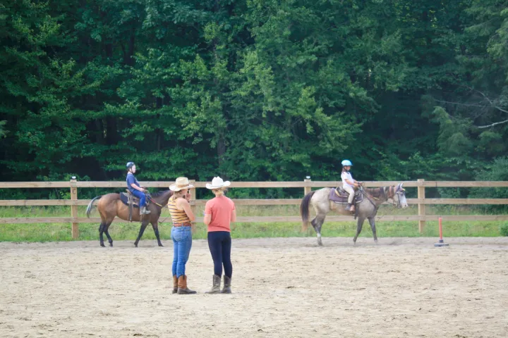 Riding lesson in a ring