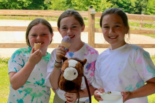 a group of kids eating ice cream