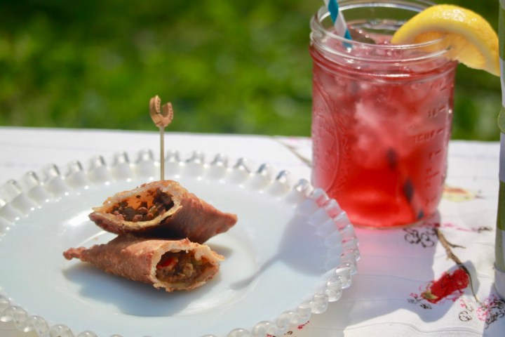 a plate of food and a cup of coffee