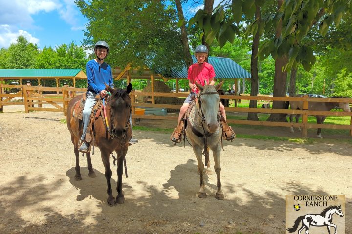 a group of people riding on the back of a horse
