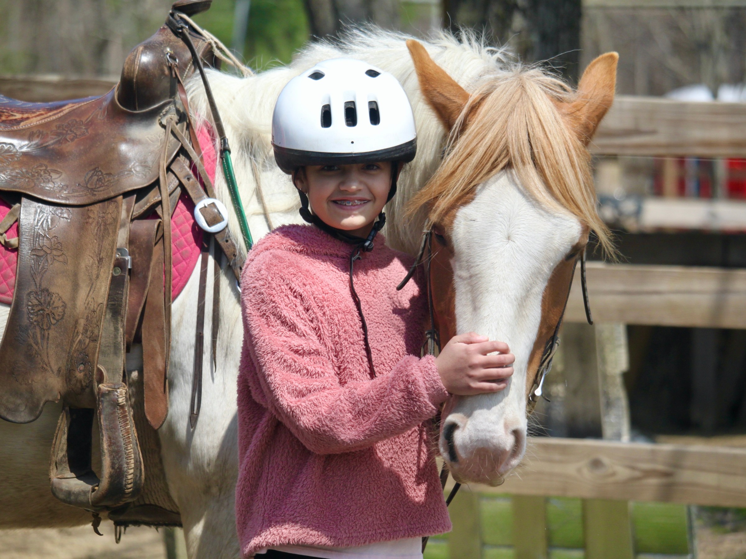 a person wearing a horse mask
